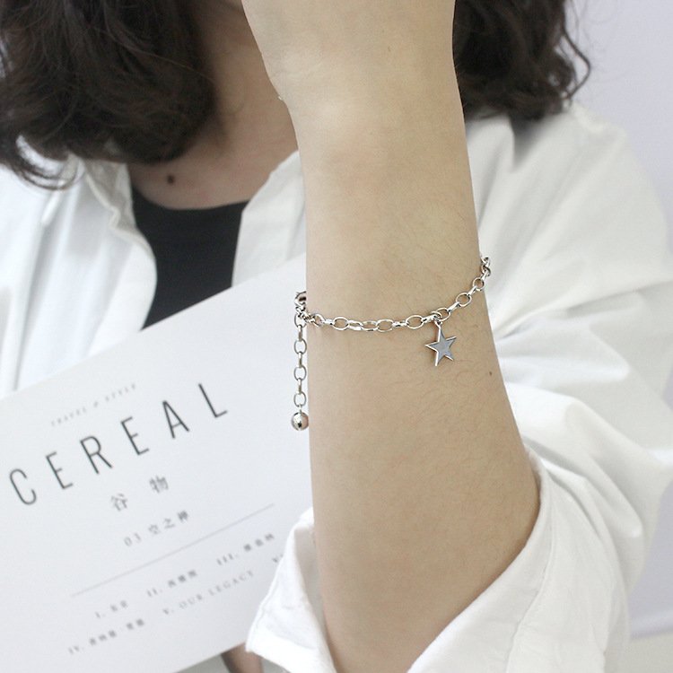 Enchanting star charm chain bracelet crafted in polished 925 sterling silver 7