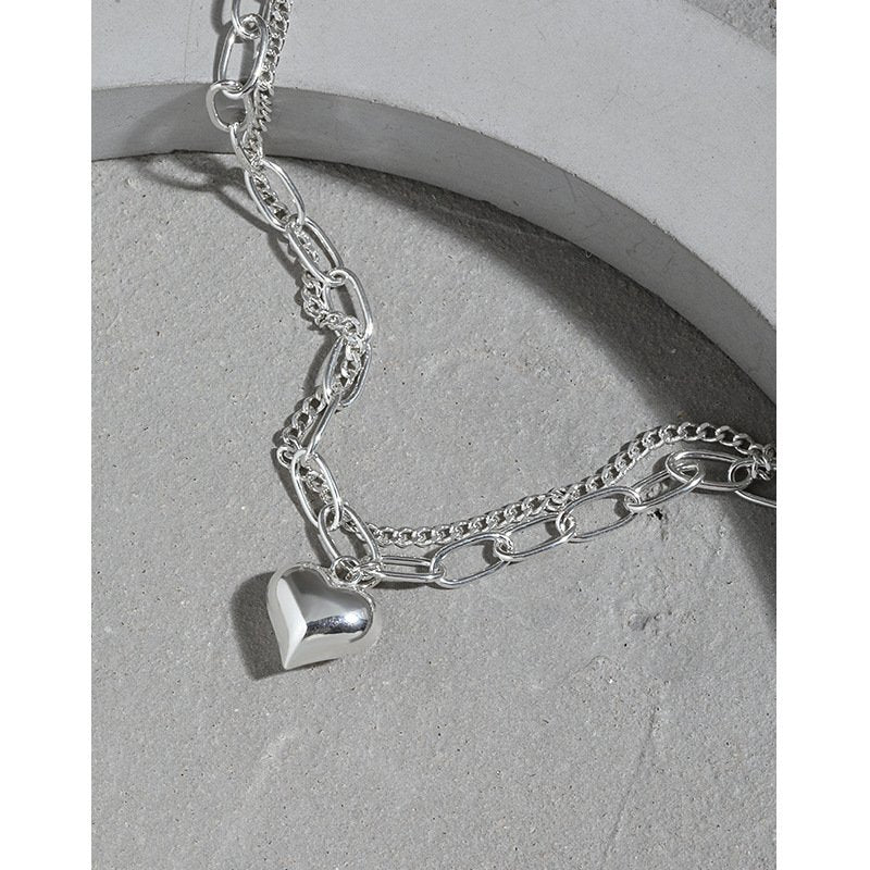 heart charm in a lovely dual-chain design in sterling silver 7