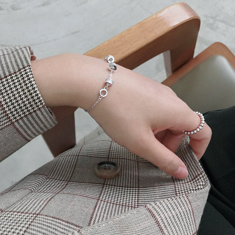 Beads charm bracelet in accents designed in a lustrous silver color 4