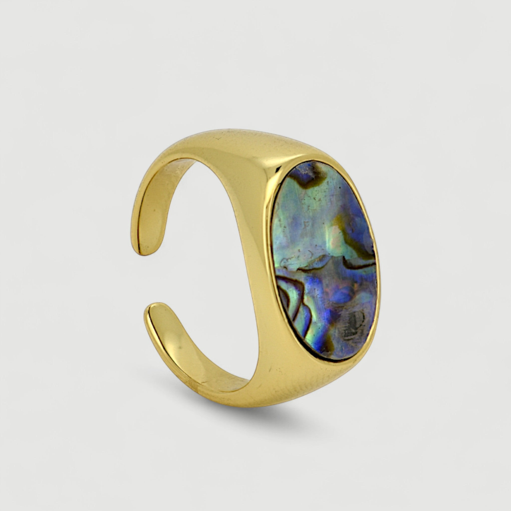 Amara Jewels gold-tone open ring with oval abalone shell inlay featuring iridescent blues, greens, and purples.