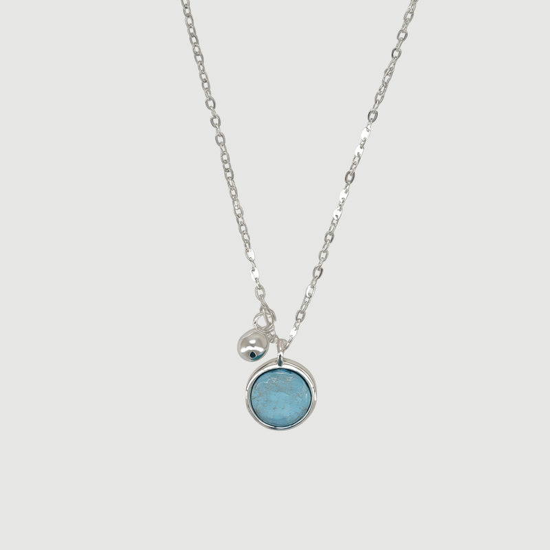 Amara Jewels sterling silver necklace with a round aqua charm and a polished silver bead.