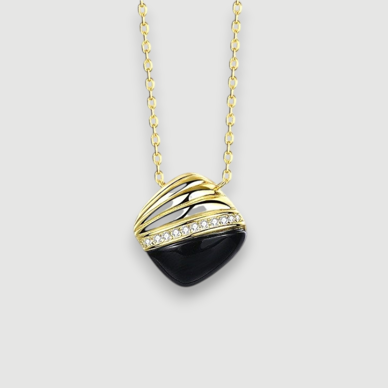 Amara Jewels gold 925 sterling silver necklace with black agate pendant, accented with crystals.