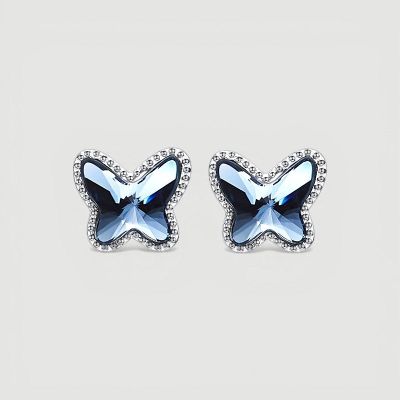 Amara Jewels blue crystal butterfly stud earrings with beaded sterling silver frame.