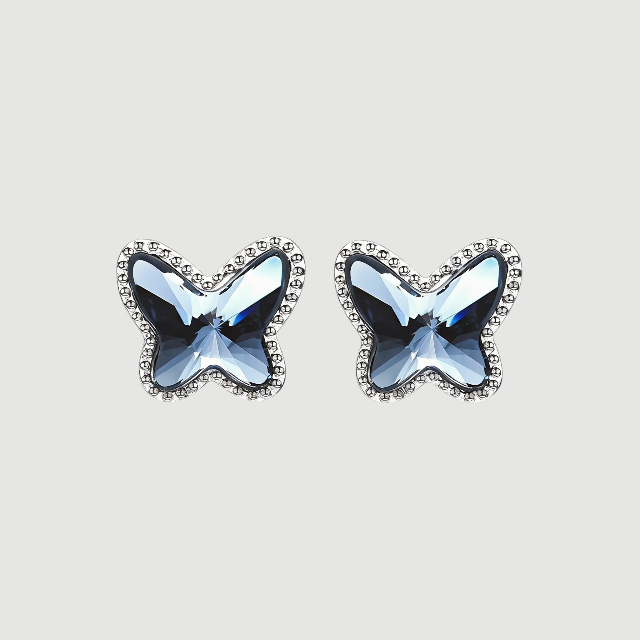Amara Jewels blue crystal butterfly stud earrings with beaded sterling silver frame.