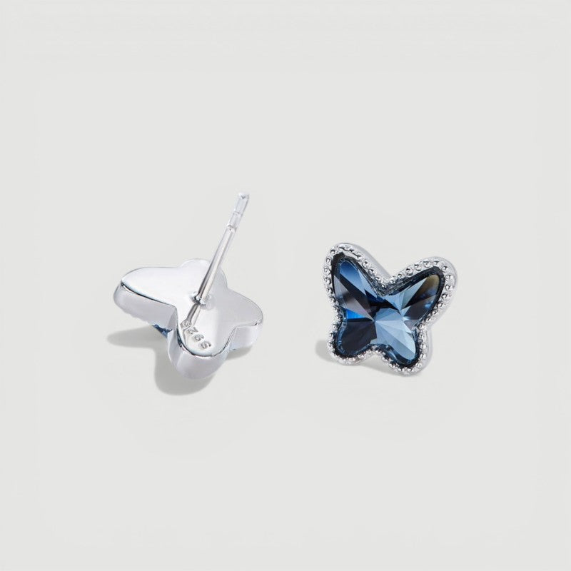 Amara Jewels blue crystal butterfly stud earrings with beaded sterling silver frame.