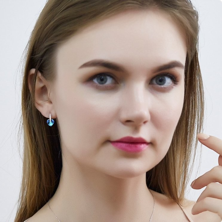 Amara Jewels blue heart-shaped crystal drop earrings with sterling silver hooks.
