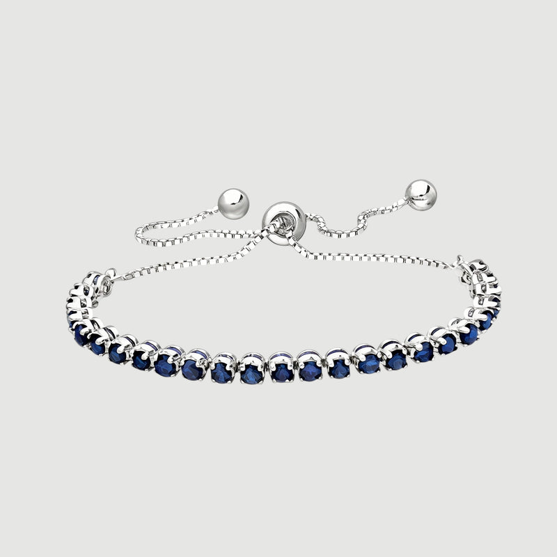 Amara Jewels sterling silver slider bracelet with deep blue sapphires and adjustable chain.