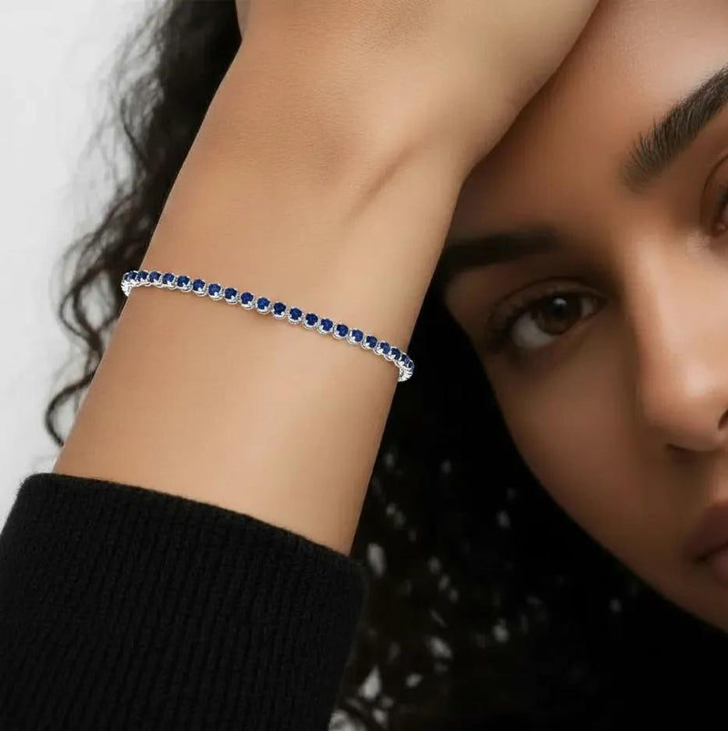 Amara Jewels sterling silver slider bracelet with deep blue sapphires and adjustable chain.