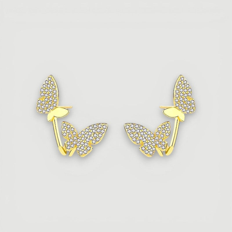 Amara Jewels gold-plated sterling silver climber earrings with cubic zirconia butterflies.