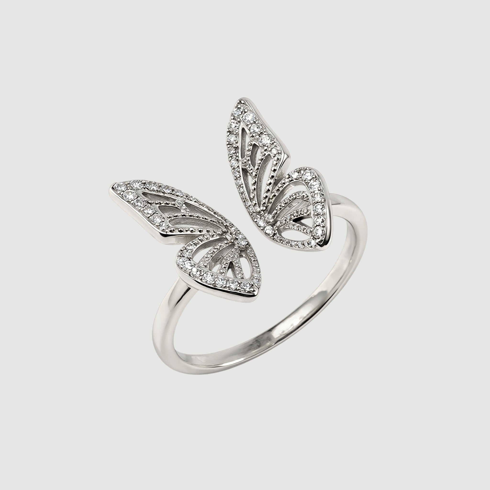 Amara Jewels 925 Sterling Silver open ring with delicate, openwork butterfly wings adorned with small crystals. Adjustable band.