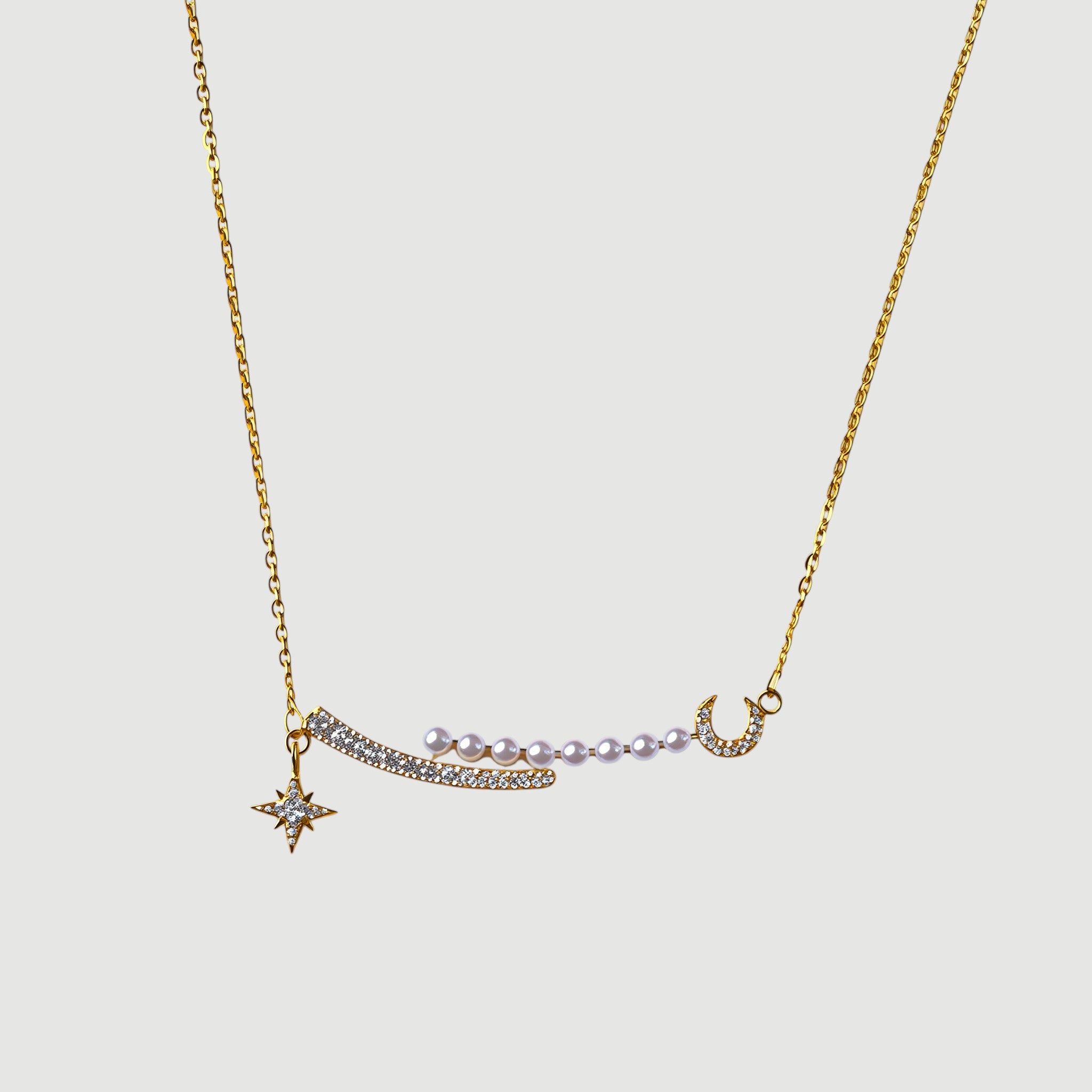 Amara Jewels sterling silver necklace with star, pearls, and crescent moon.