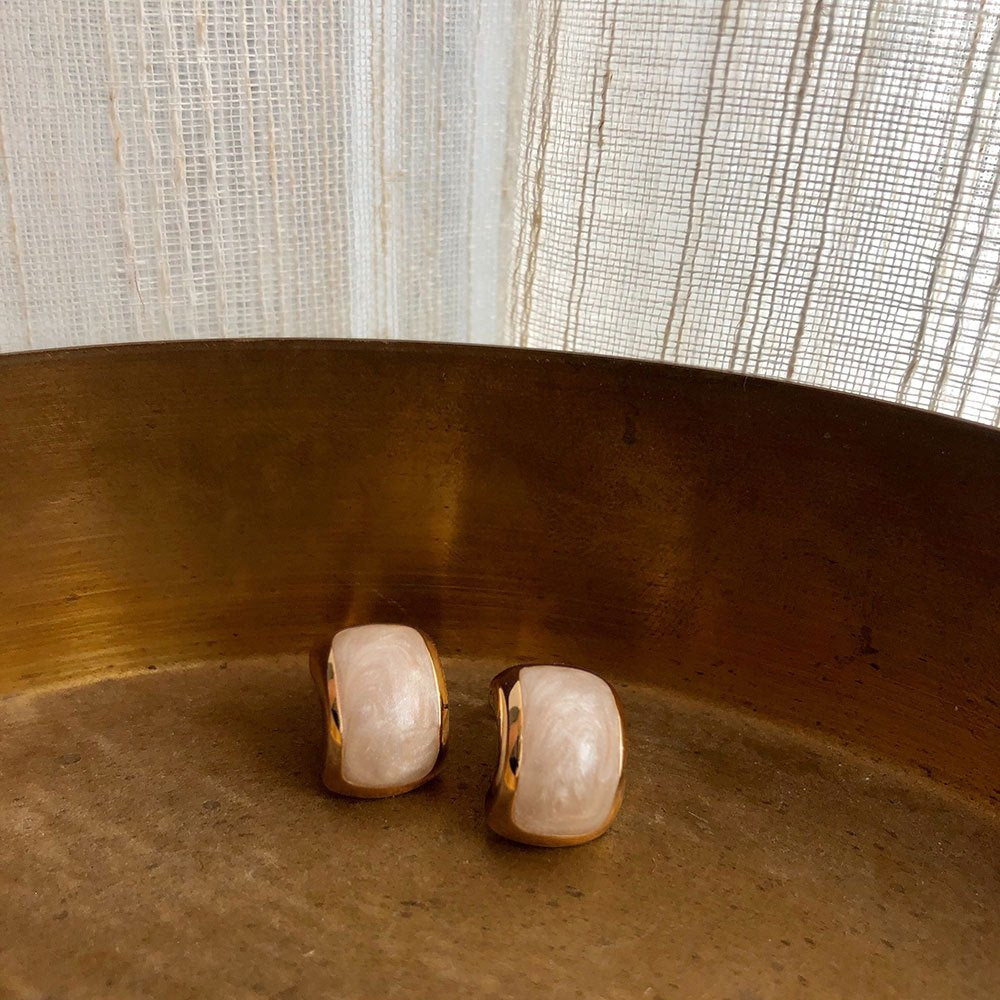 Amara Jewels champagne pearl stud earrings with textured gold plating and half-moon shape.