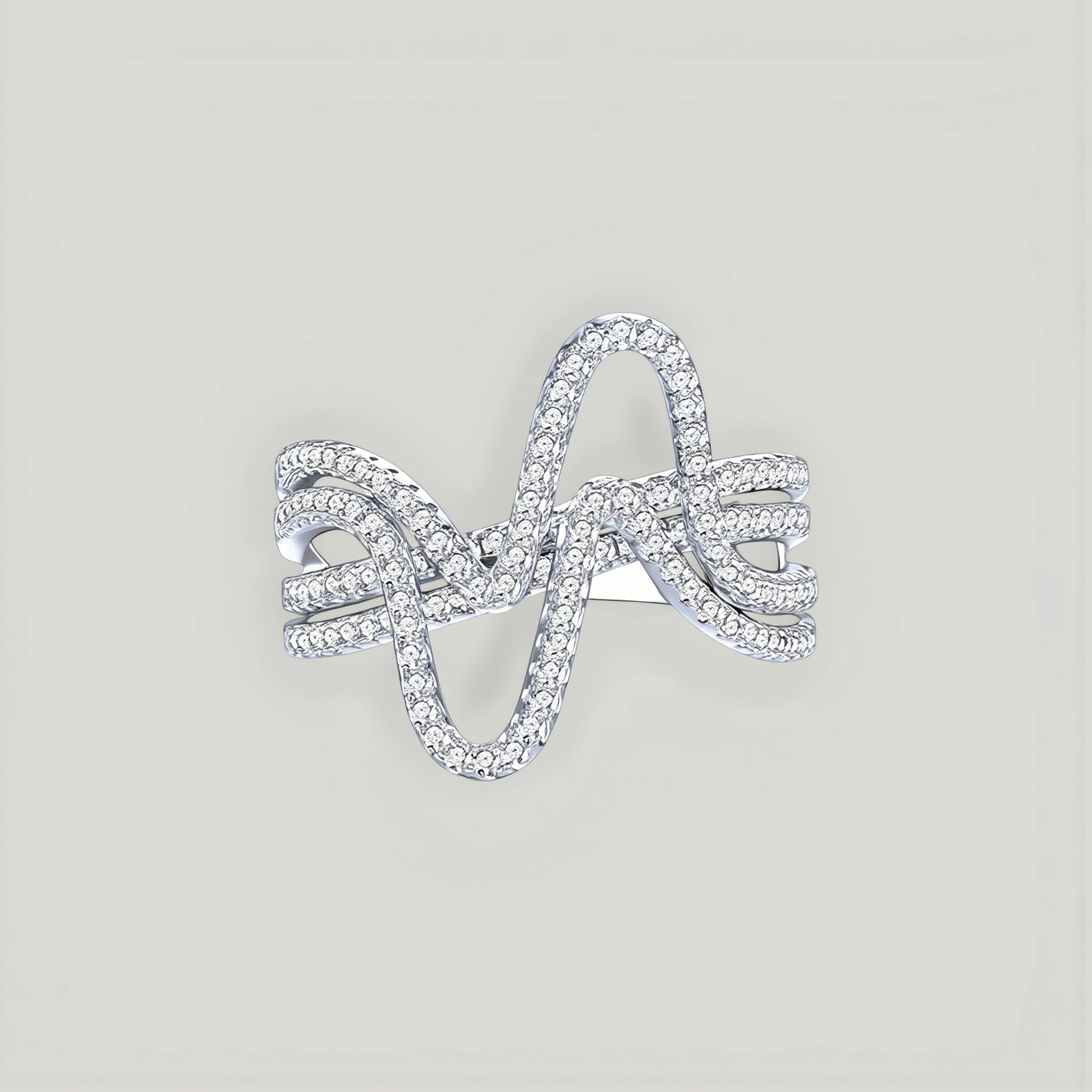 Amara Jewels sterling silver statement ring with cubic zirconia in a curved wave design.