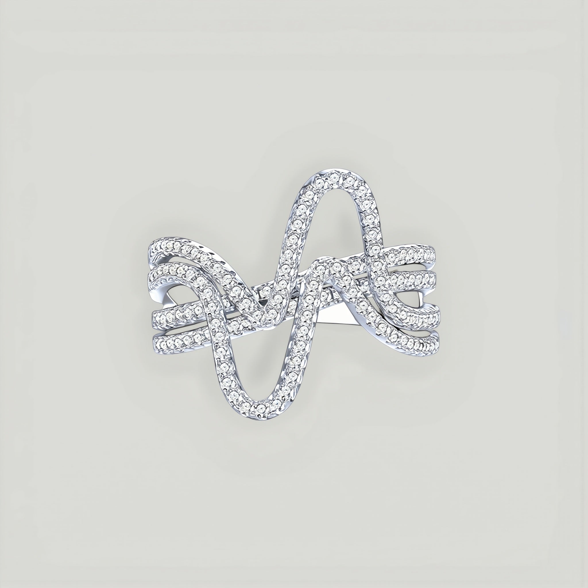 Amara Jewels sterling silver statement ring with cubic zirconia in a curved wave design.