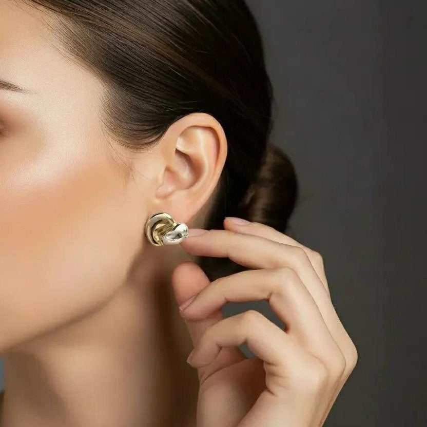Amara Jewels dual-tone stud earrings in 18K gold-plated sterling silver with organic, fluid shape.