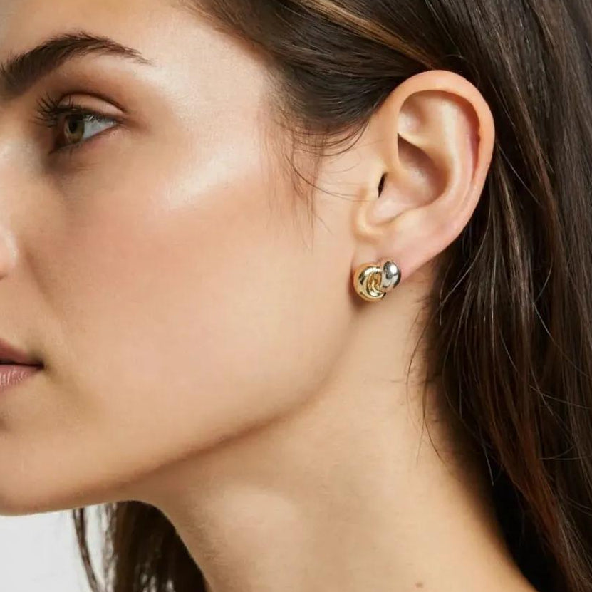 Amara Jewels dual-tone stud earrings in 18K gold-plated sterling silver with organic, fluid shape.