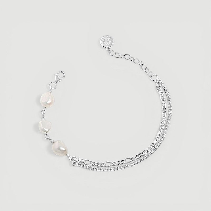 Amara Jewels 925 sterling silver bracelet with freshwater pearls and a dual chain design, one chain is accented with sparkling stones.