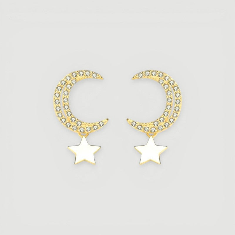 Amara Jewels gold-plated sterling silver crescent moon earrings with cubic zirconia and dangling star charm.