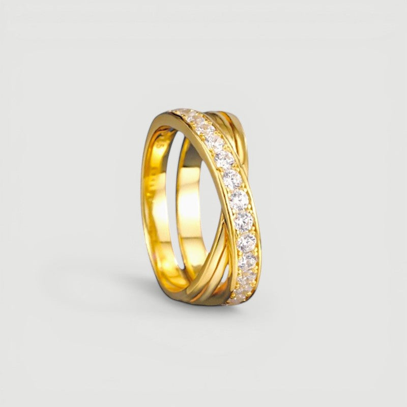 Amara Jewels gold-tone 925 sterling silver criss-cross ring with pavé cubic zirconia stones.
