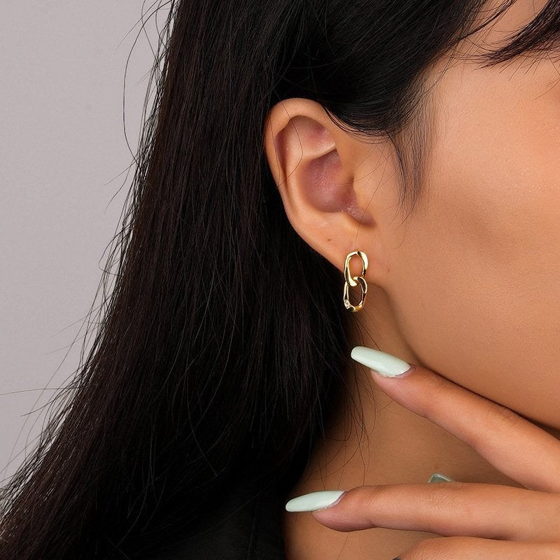 Amara Jewels gold-plated sterling silver double link drop earrings with cubic zirconia accent.