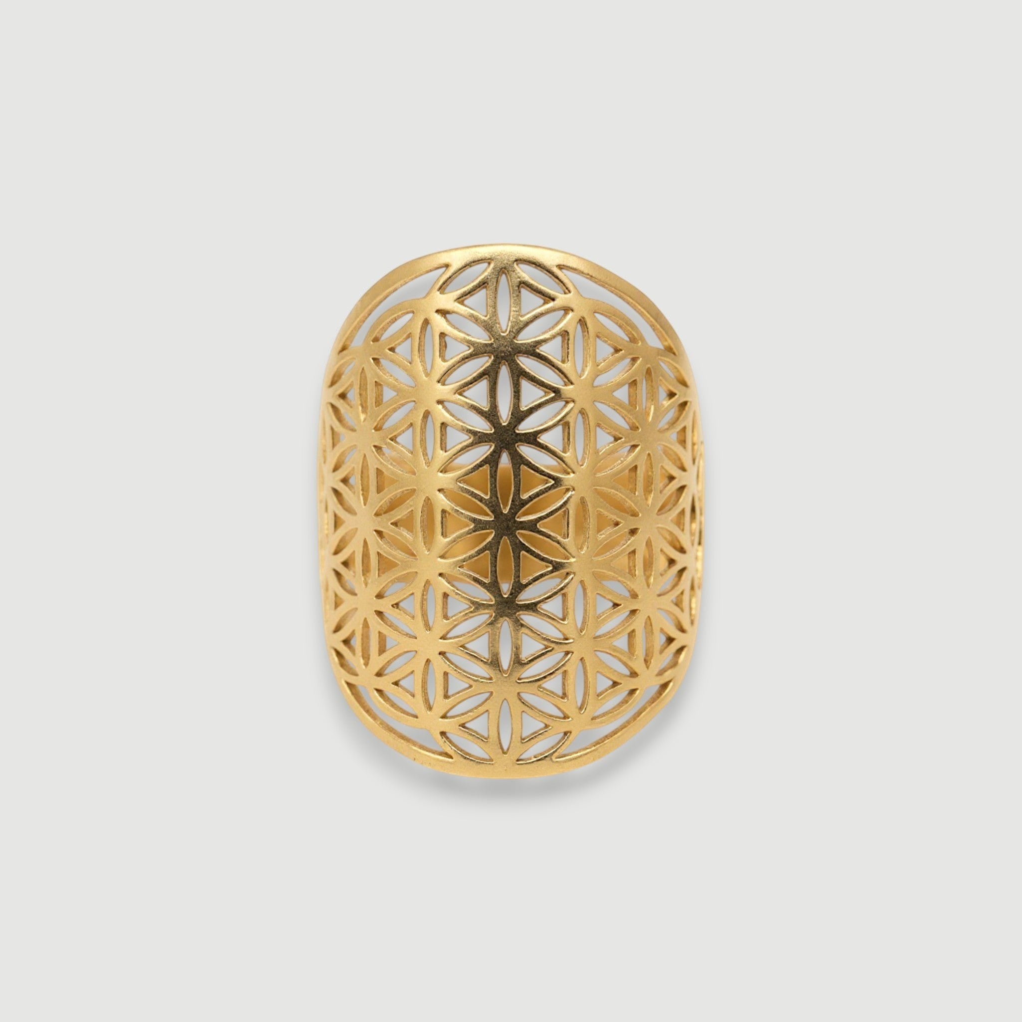 Amara Jewels gold vermeil statement ring with floral cutout pattern and sacred geometry design.