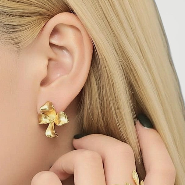 Amara Jewels gold-vermeil sterling silver floral stud earrings with textured petals.