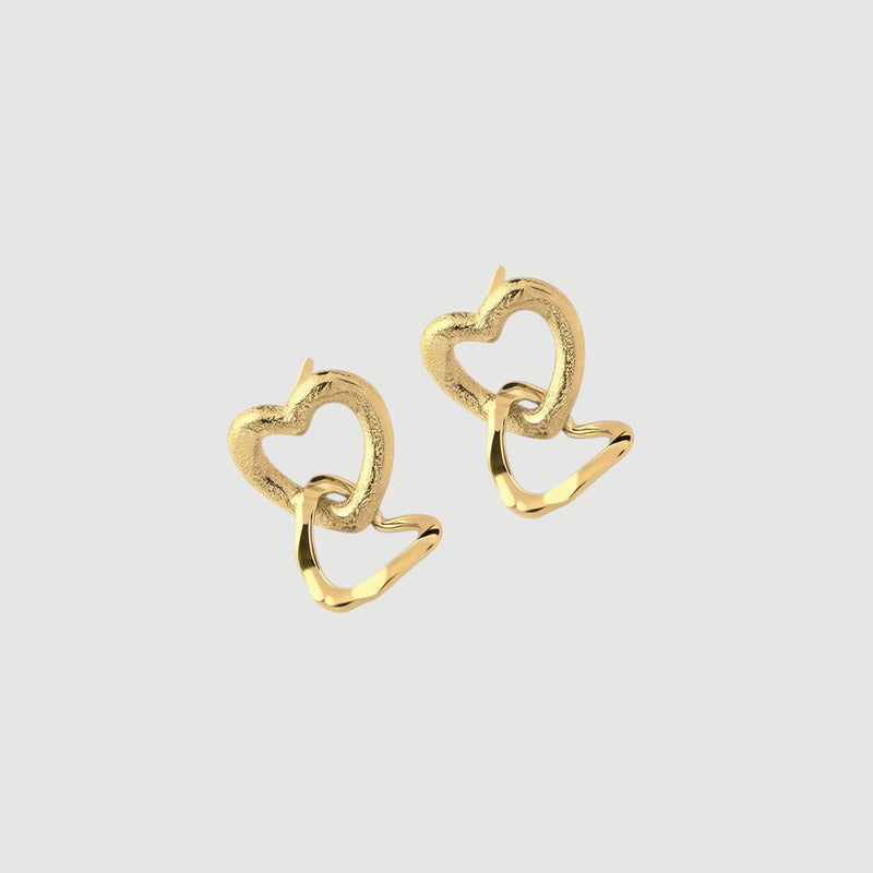 Amara Jewels gold-vermeil sterling silver interlocking heart earrings with textured and polished finishes.