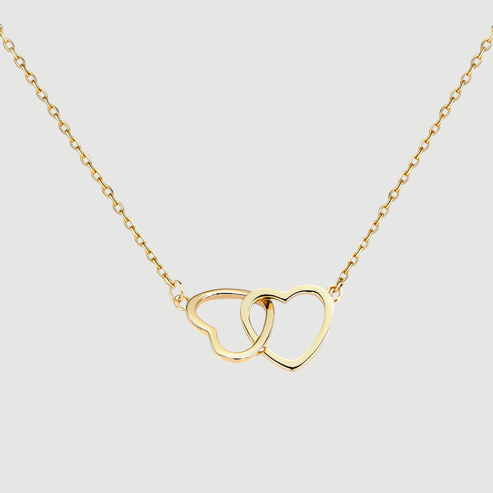 Amara Jewels gold interlocking hearts necklace with hollow design, perfect for gifting.