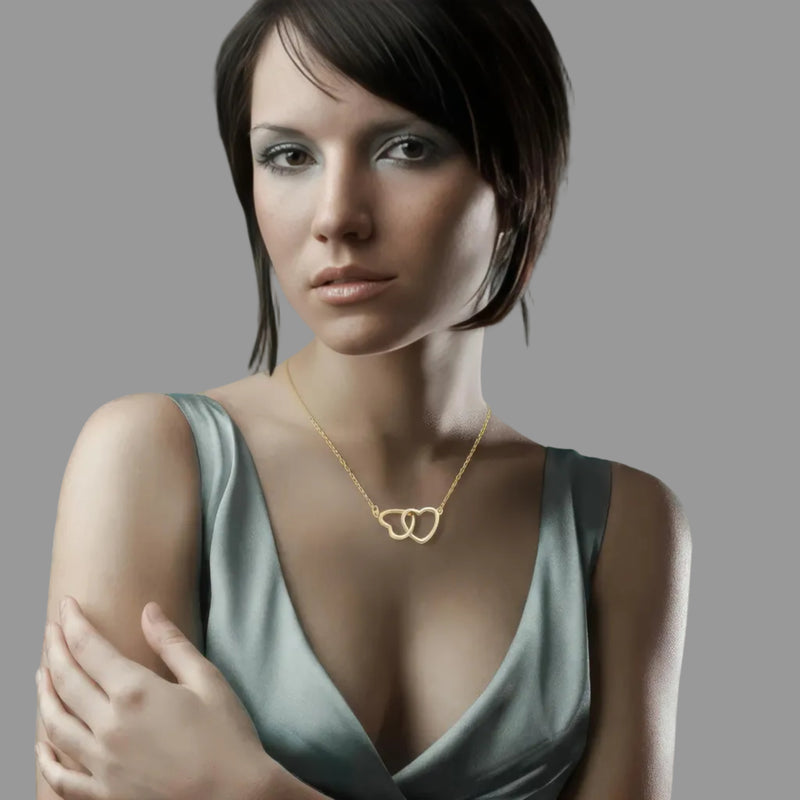 Amara Jewels gold interlocking hearts necklace with hollow design, perfect for gifting.