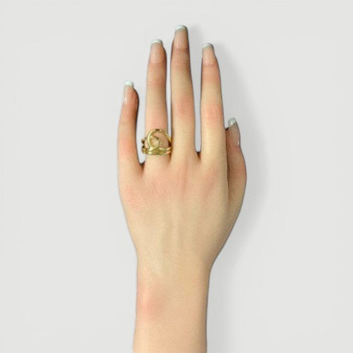 Amara Jewels gold-plated 925 sterling silver ring with an open knot design. Adjustable.