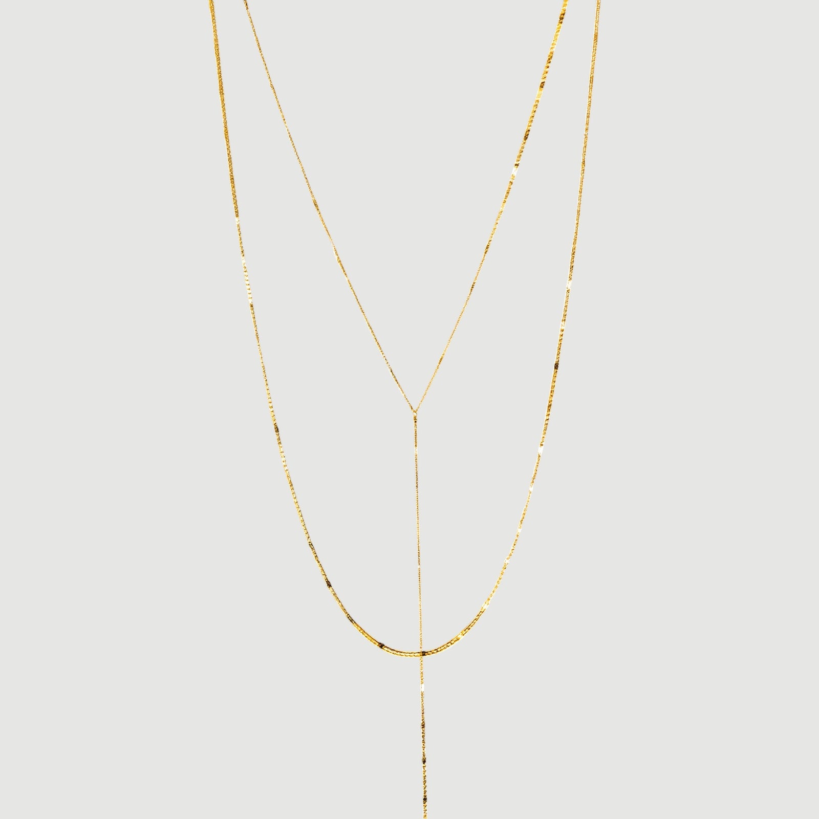 Amara Jewels gold lariat necklace with a Y-shaped chain and subtle bead accents, crafted from 925 sterling silver.
