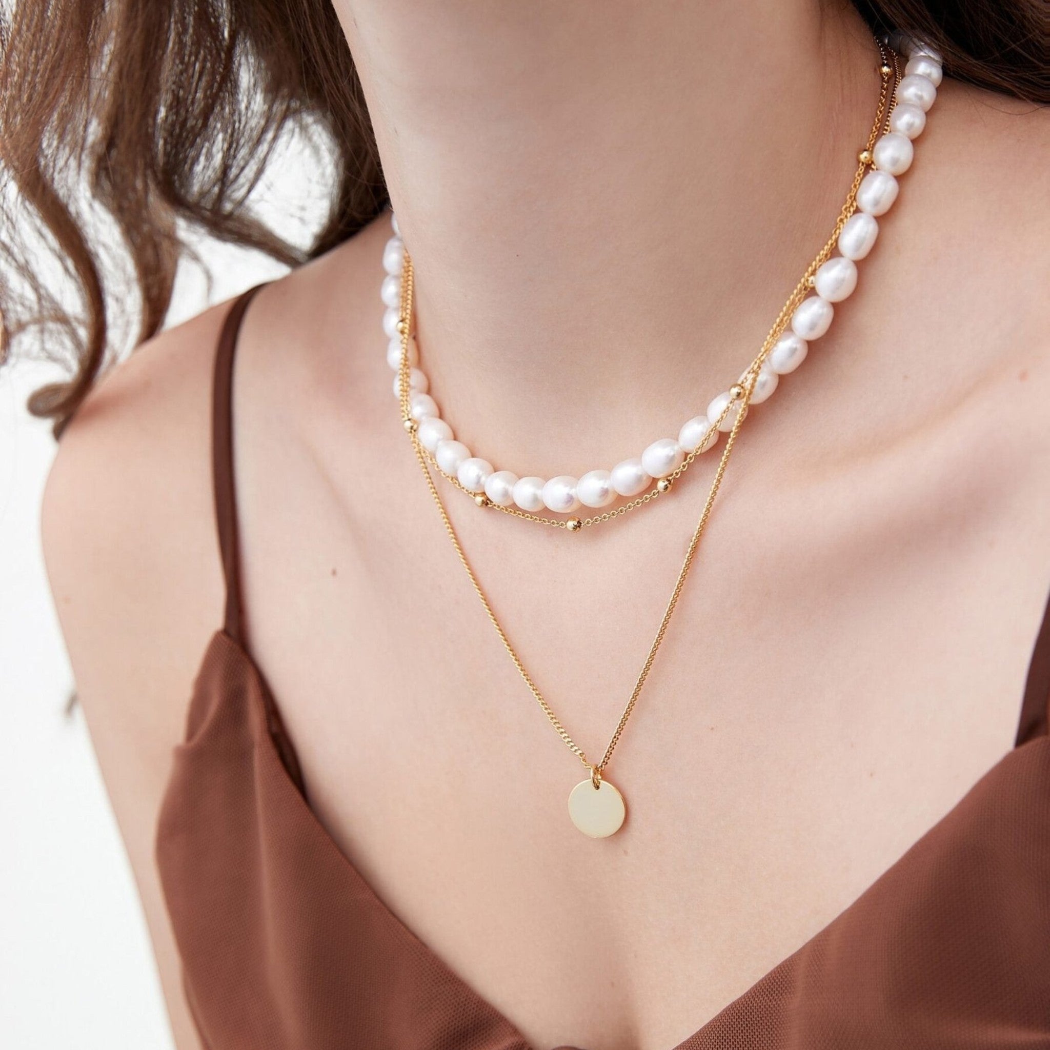 Amara Jewels gold-plated sterling silver layered necklace with bead chain and disc charm.