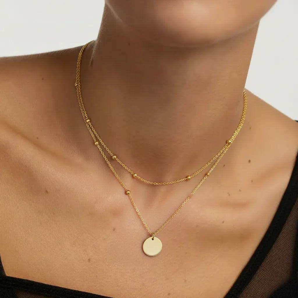 Amara Jewels gold-plated sterling silver layered necklace with bead chain and disc charm.