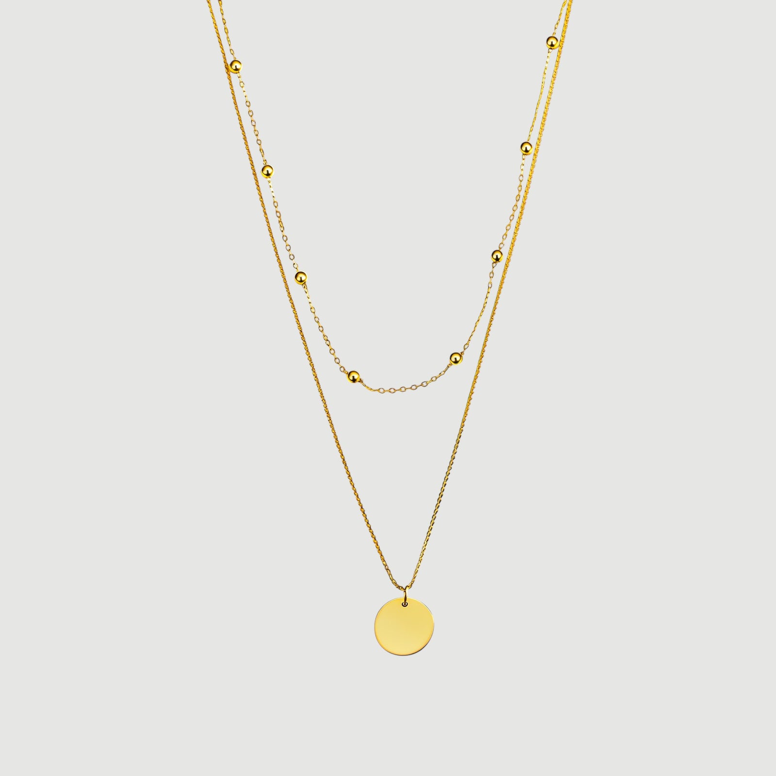 Amara Jewels gold-plated sterling silver layered necklace with bead chain and disc charm.