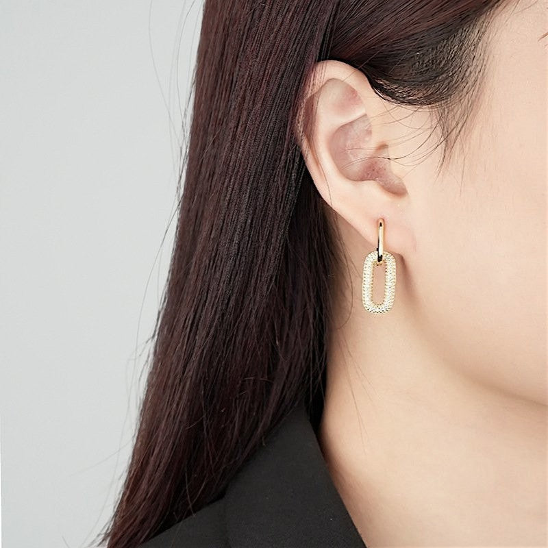 Amara Jewels gold-plated sterling silver link drop earrings with pave cubic zirconia.