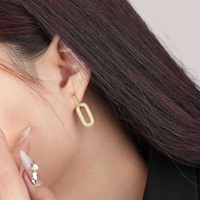 Amara Jewels gold-plated sterling silver link drop earrings with pave cubic zirconia.