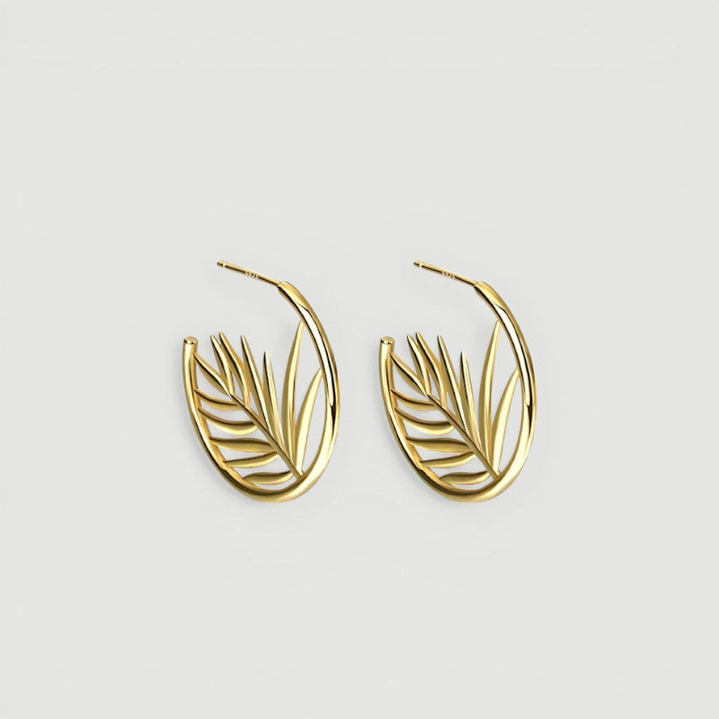 Amara Jewels gold-plated sterling silver hoop earrings with intricate palm leaf design. Elegant, nature-inspired statement jewelry.