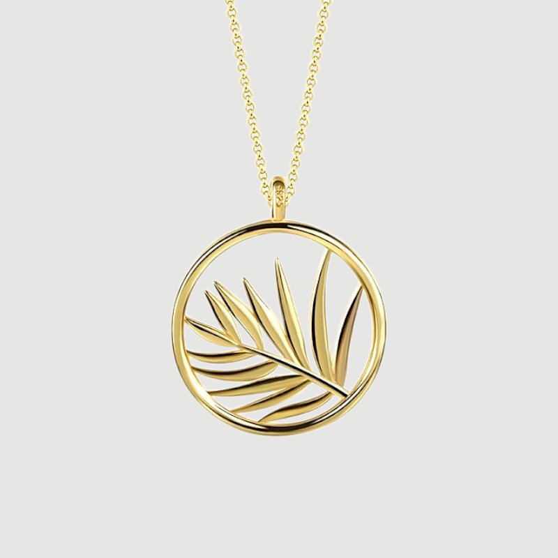Amara Jewels gold plated sterling silver necklace with open circle palm leaf pendant.