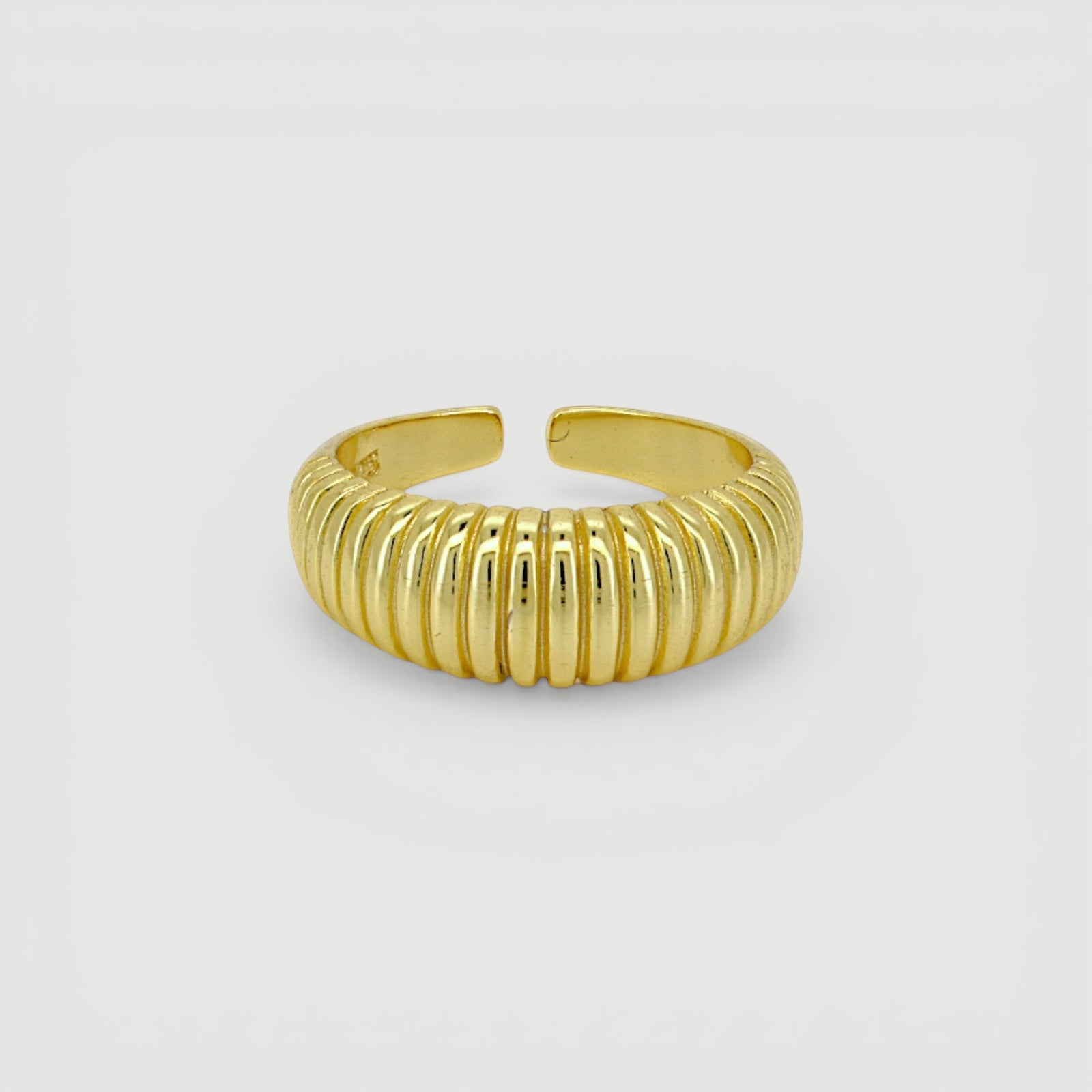 Amara Jewels gold-plated 925 sterling silver ribbed statement ring with adjustable fit.