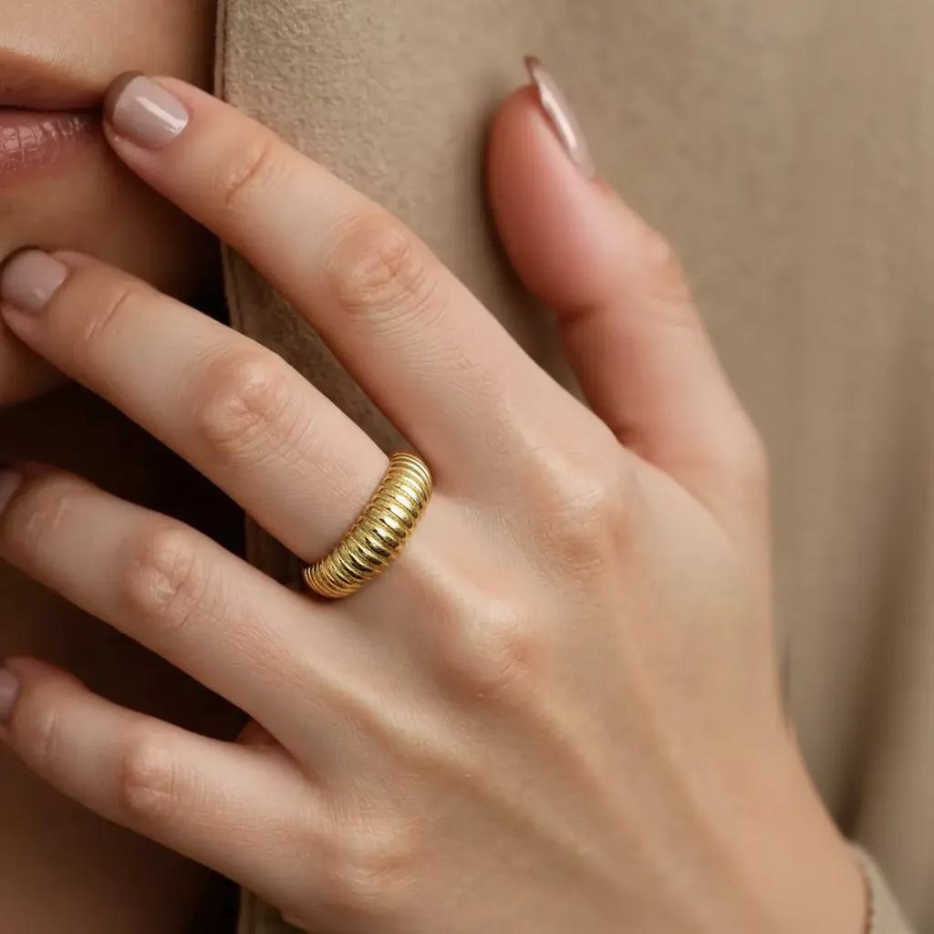 Amara Jewels gold-plated 925 sterling silver ribbed statement ring with adjustable fit.