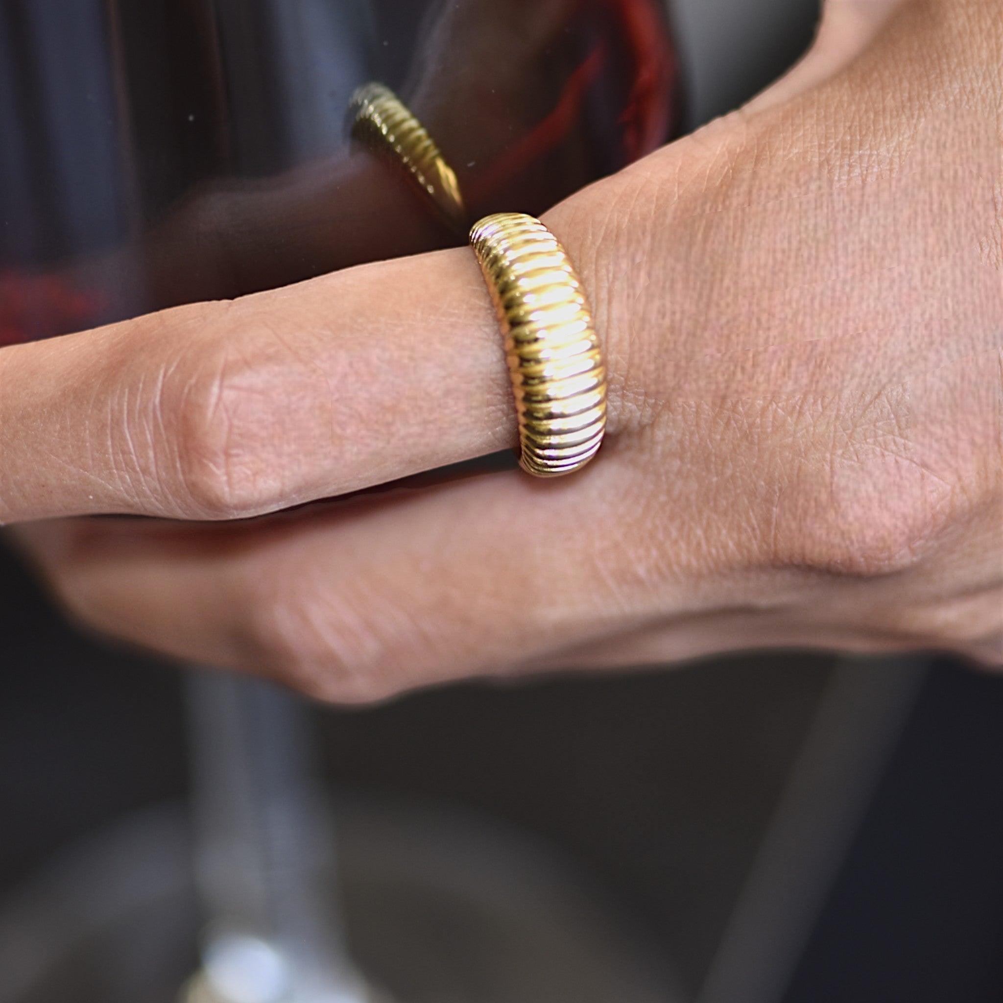 Amara Jewels gold-plated 925 sterling silver ribbed statement ring with adjustable fit.