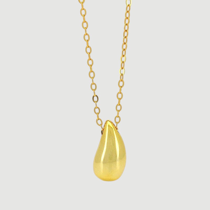 Amara Jewels gold tone teardrop pendant necklace on a dainty chain, made of 925 sterling silver.