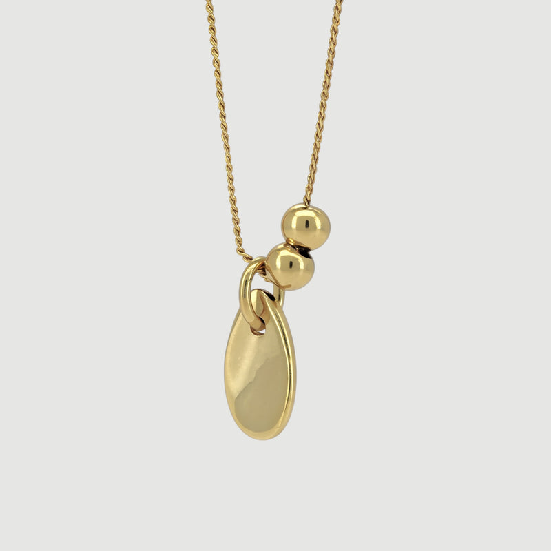 Amara Jewels 18K yellow gold polished sterling silver teardrop pendant necklace with two smooth beads on a delicate chain.