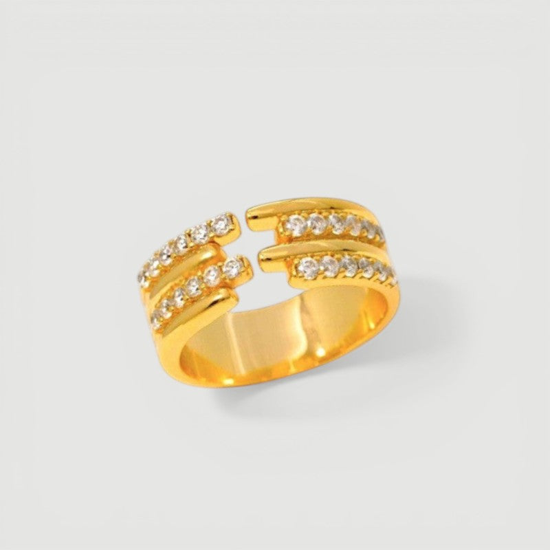 Amara Jewels gold-tone sterling silver open ring with three bands adorned with cubic zirconia.