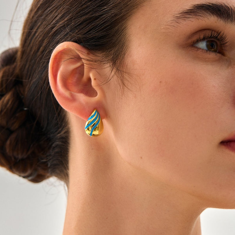 Amara Jewels gold-plated 925 sterling silver teardrop earrings with blue enamel wave pattern.