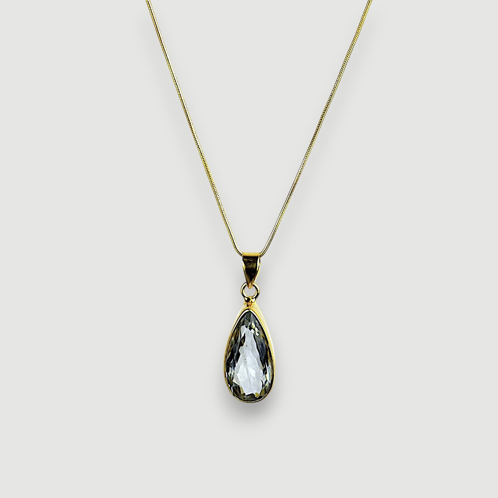 Amara Jewels sterling silver green amethyst teardrop pendant necklace on a snake chain and 18k gold vermeil.