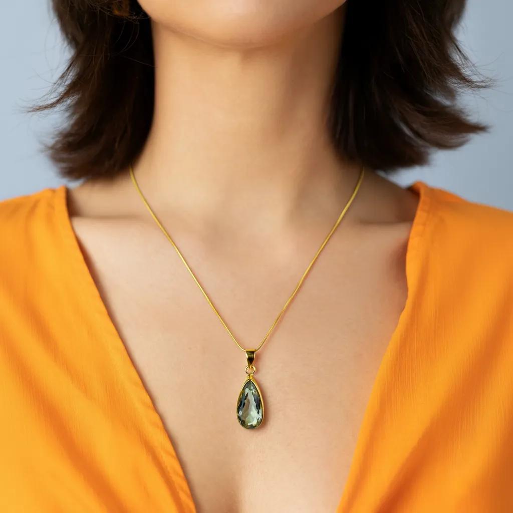 Amara Jewels sterling silver green amethyst teardrop pendant necklace on a snake chain and 18k gold vermeil.
