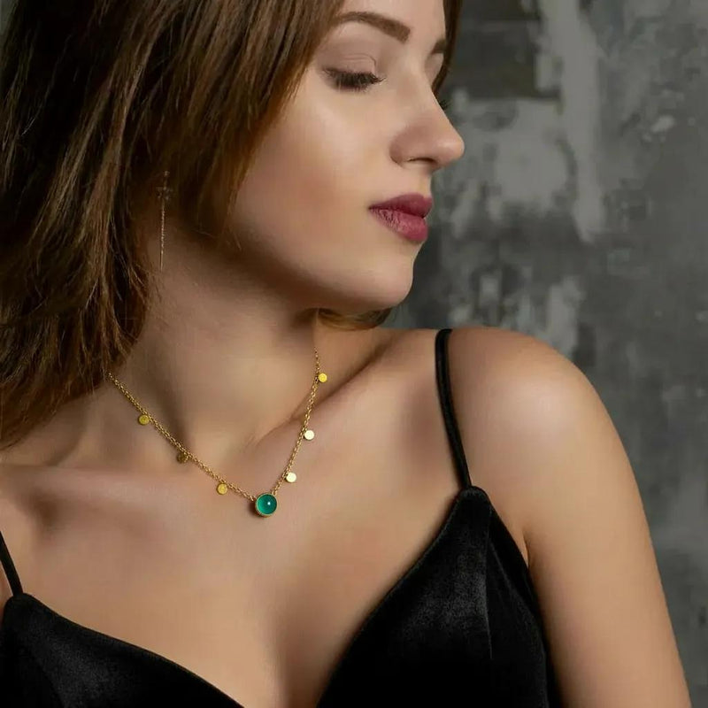 Amara Jewels green chalcedony charm necklace in 18K gold vermeil over sterling silver with coin charms.