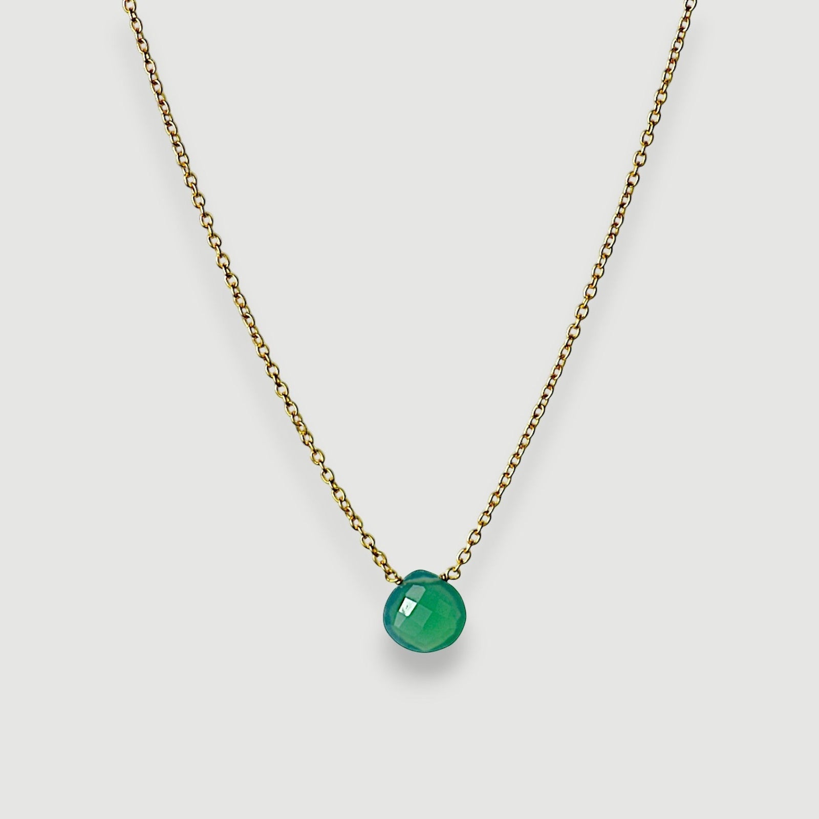 Amara Jewels 18K gold vermeil necklace with a faceted green chalcedony gemstone pendant.