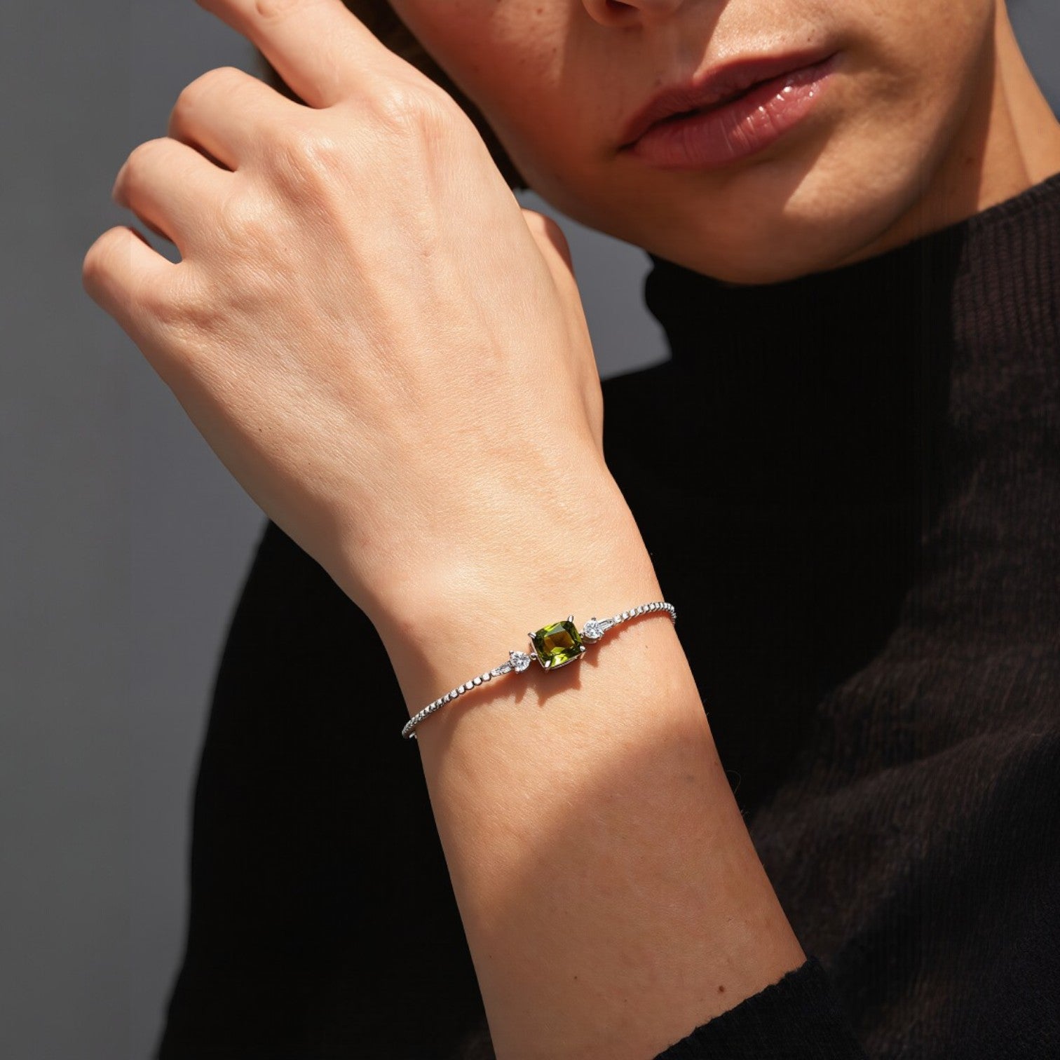 Amara Jewels elegant green gemstone 925 sterling silver bracelet with box chain and adjustable clasp.